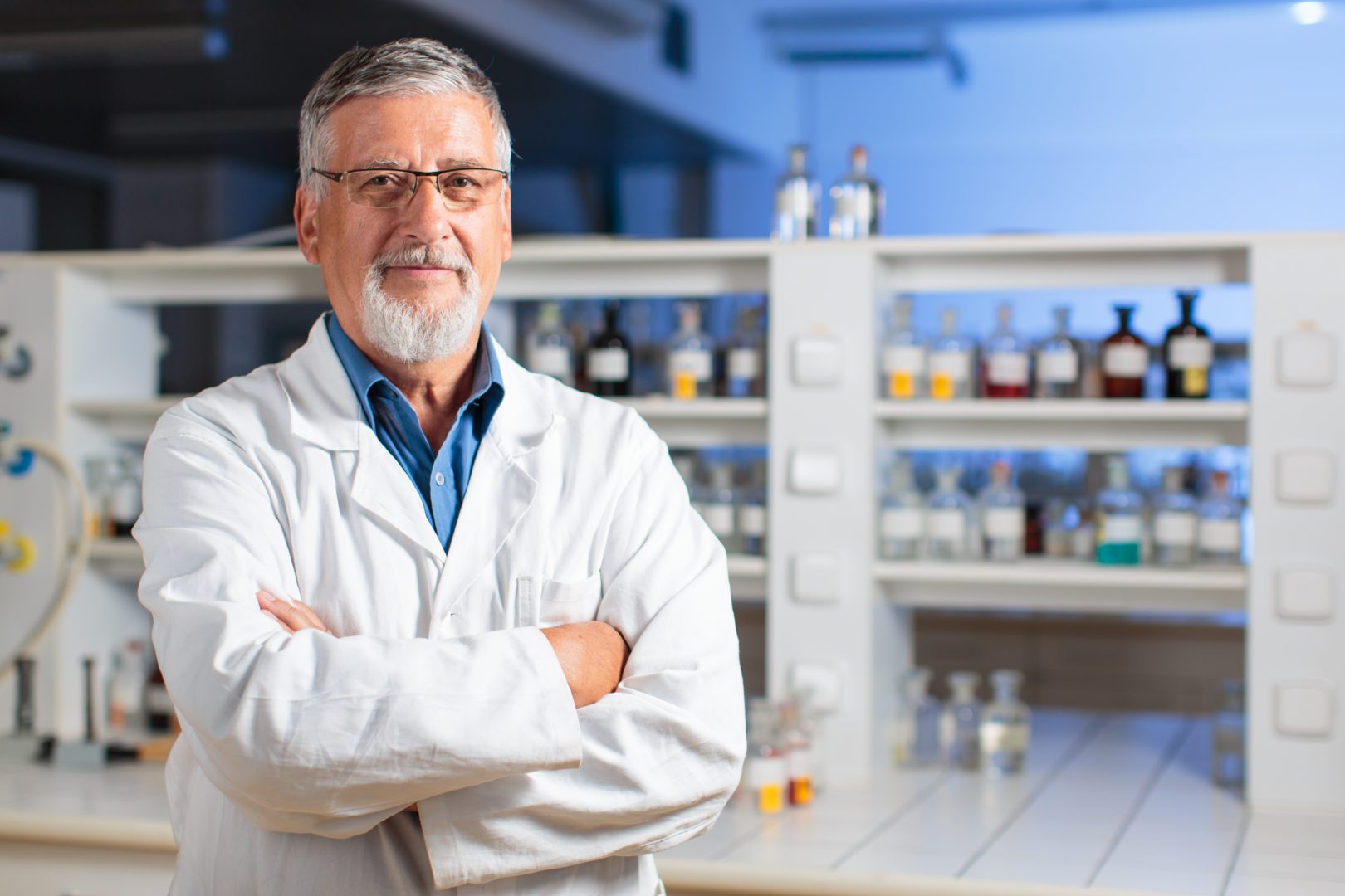 Senior chemistry professor/doctor in a lab (color toned image)